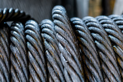 Thick wire rope made up of multiple strands. 